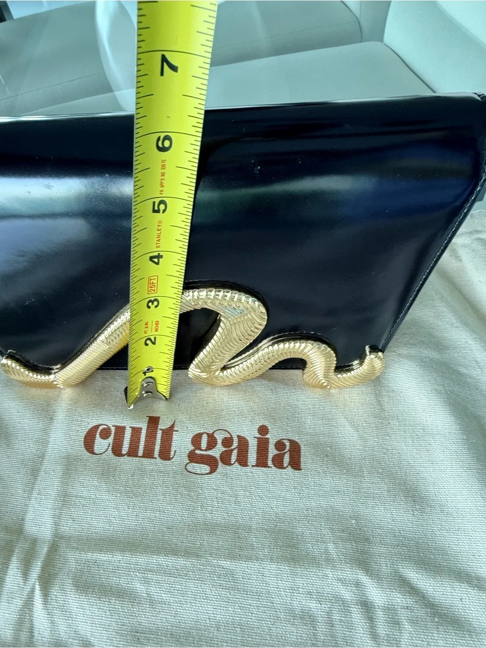 Cult Gaia Black Patent Shoulder Bag with Gold Snake Accent